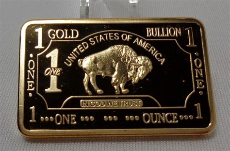 1 oz One Troy Ounce USA American Buffalo. . One troy ounce 100 mills 999 fine gold clad value